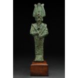 AN ANCIENT EGYPTIAN BRONZE VOTIVE FIGURE OF OSIRIS