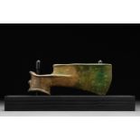 BRONZE SOCKETED AXE HEAD ON STAND