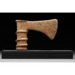 BRONZE SOCKETED AXE HEAD ON STAND