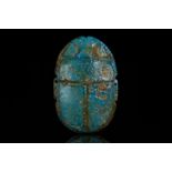 AN ANCIENT EGYPTIAN FAIENCE PECTORAL SCARAB