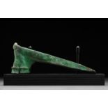 BRONZE SOCKETED AXE HEAD ON STAND