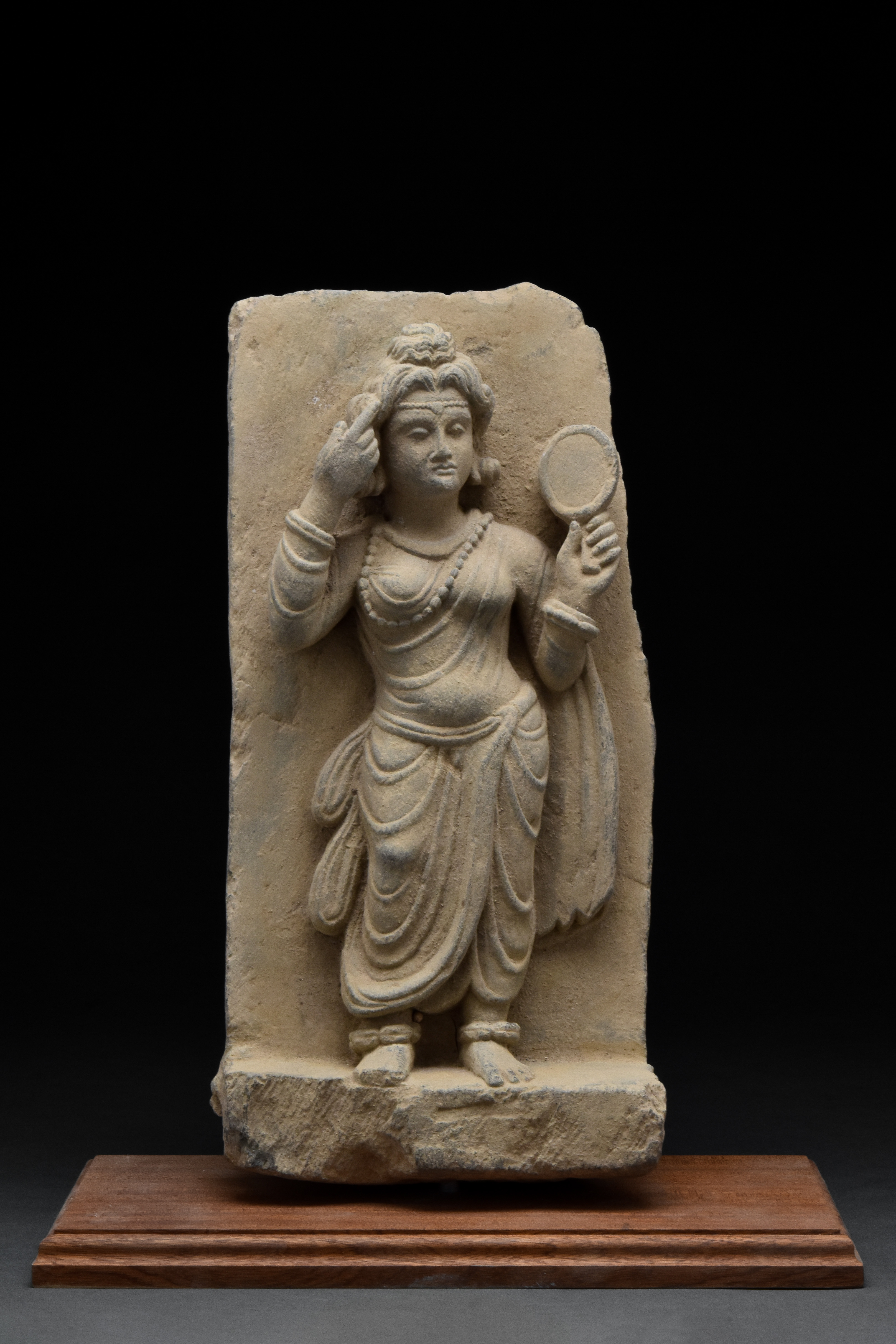 GANDHARAN STATUE OF A GANIKA (COURTESAN)