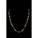 ROMAN NECKLACE WITH CARNELIAN STONE, GOLD AND GLASS BEADS