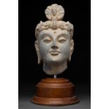 GANDHARAN HEAD OF A BODHISATTVA WITH STAND