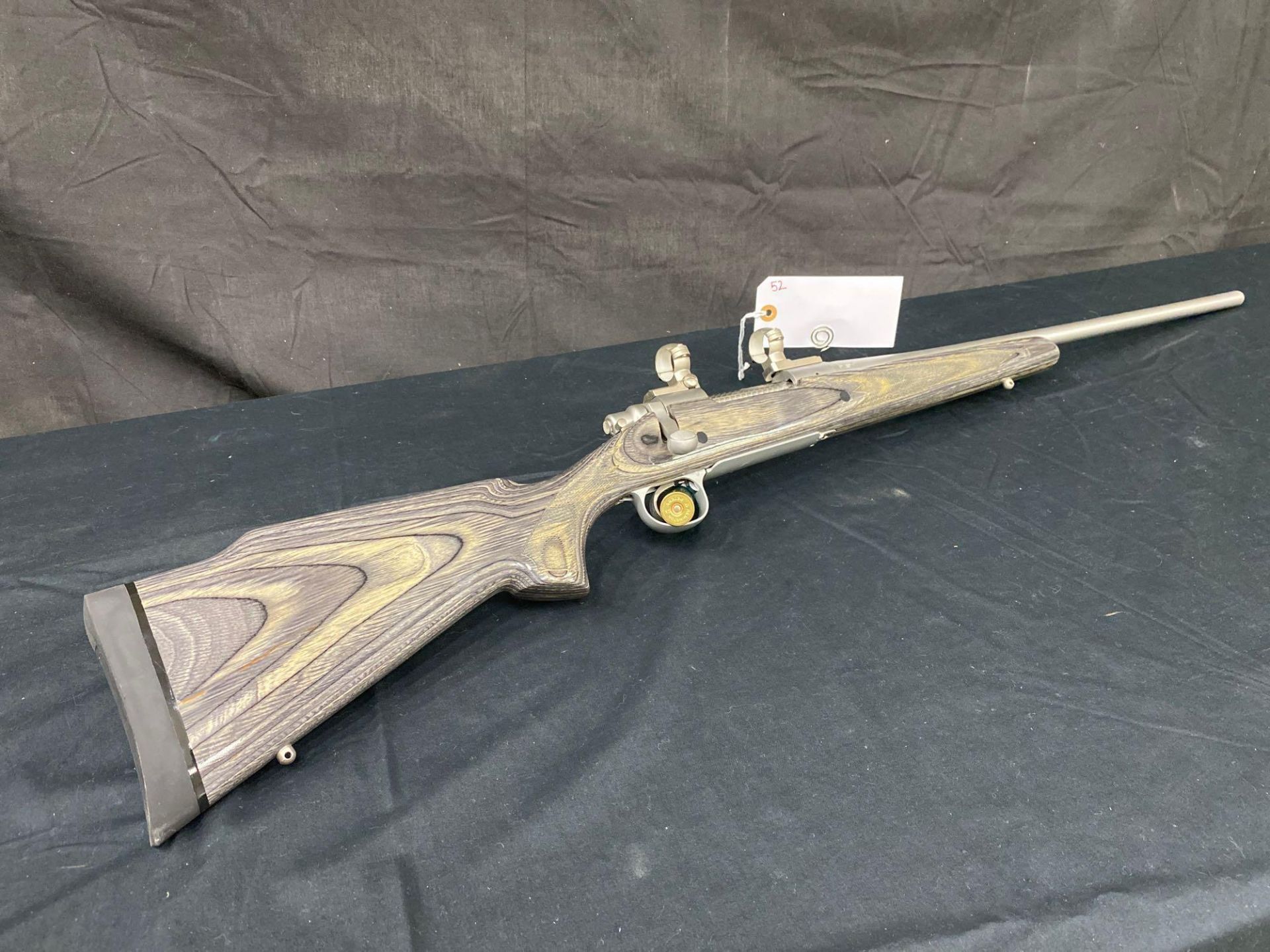 REMINGTON MODEL 700, 7MM REM MAG, STAINLESS WITH LAMINATED STOCK. SN#56341304