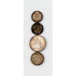 Vier diverse Silbermünzen