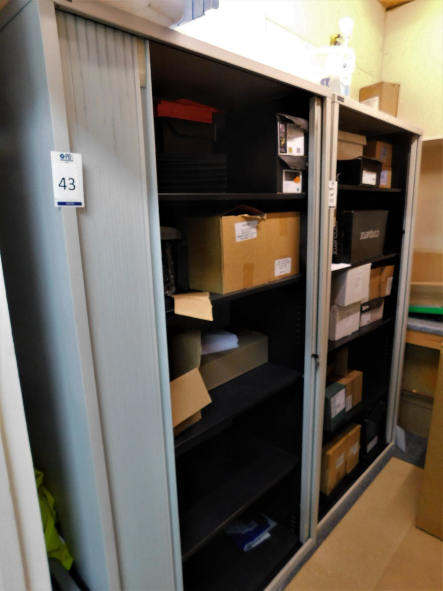 Contents of Storeroom including: Two 2m Roller Shutter Front Cabinets, 3-Drawer Filing Cabinet &