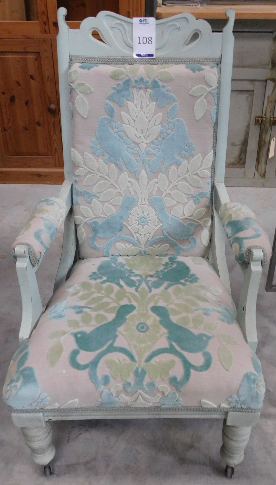 Art Nouveau Armchair, Carved Cresting Rail, Padded Back, Seat and Arms above Turned Tapering