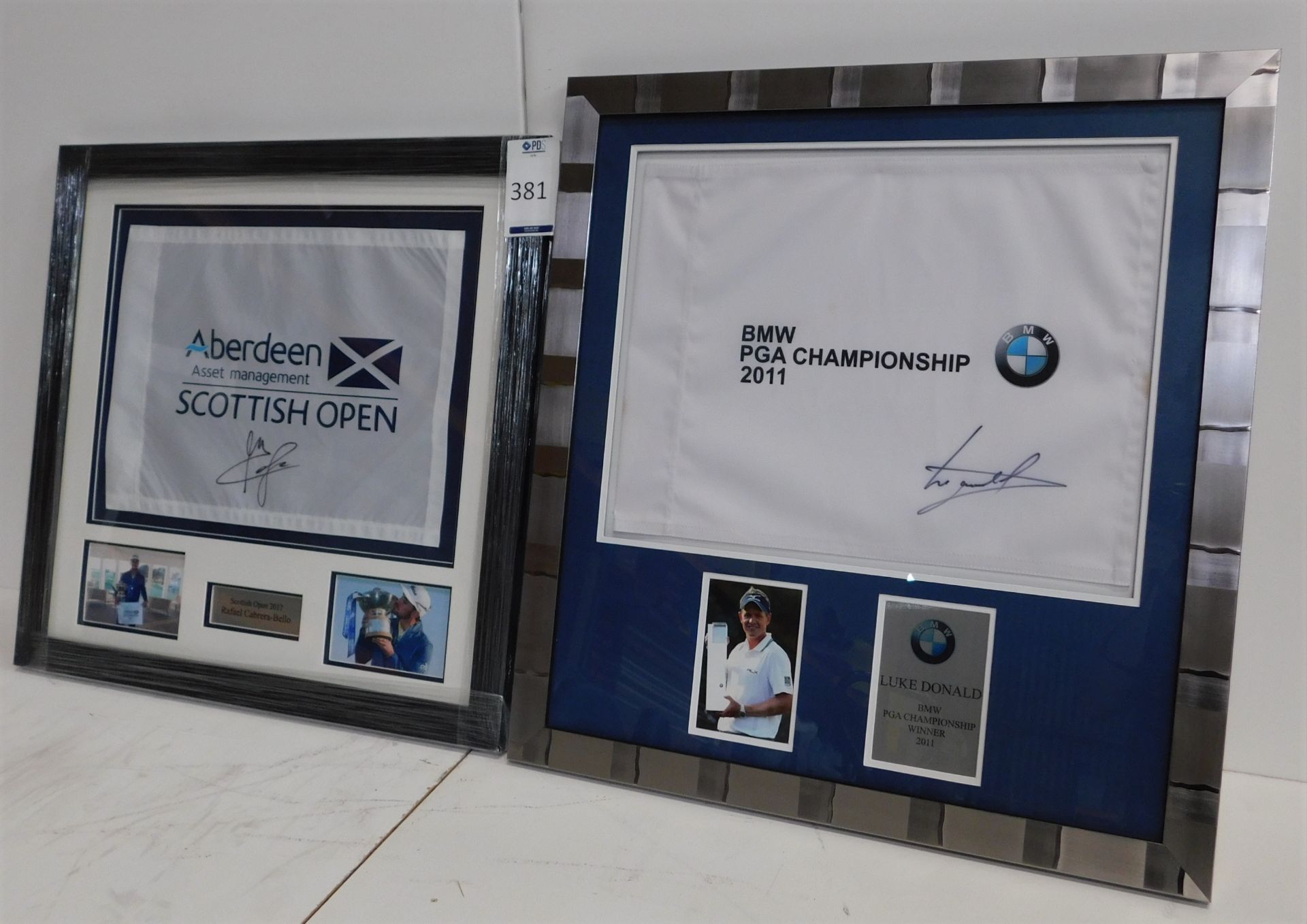Two Framed BMW Championship Pin Flags 2011 & 2012 Signed by Luke Donald (Overall size: 69cm x 66cm);