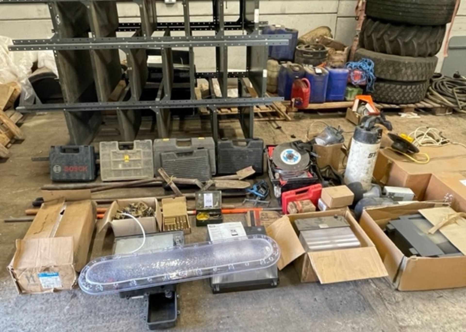 Miscellaneous Items Including Two FL500 Lights, Floodlights, Hand Tools, 4 Slotted Steel Racks, Tool