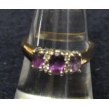 9ct gold amethyst and diamond ring. Size N & 1/2. Approx weight 3.6g. (B.P. 21% + VAT)