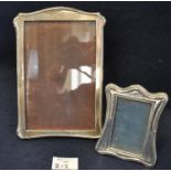 Two rectangular silver mounted photograph frames of plain form. (2) (B.P. 21% + VAT)