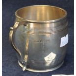 Silver barrel shaped christening mug with loop handle and reeded bands. 7cm high approx, 4.2 troy