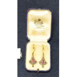 Pair of ruby and diamond drop earrings. Approx weight 4.4g. (B.P. 21% + VAT)