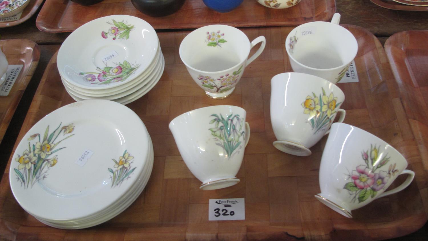 17 piece Royal Albert bone china 'Flowers of the Month' teacups and saucers with matching side