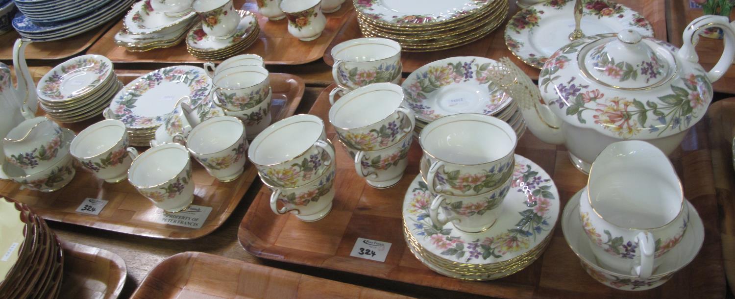 Two trays of Paragon fine bone china 'country lane' design teaware to include; teapot, cups,