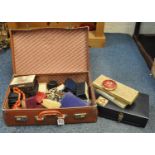 Small suitcase containing assorted costume jewellery, pocket watch, opera glasses etc. (B.P. 21% +