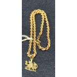 9ct gold dragon pendant on 9ct gold chain. Approx weight 10.9g. (B.P. 21% + VAT)