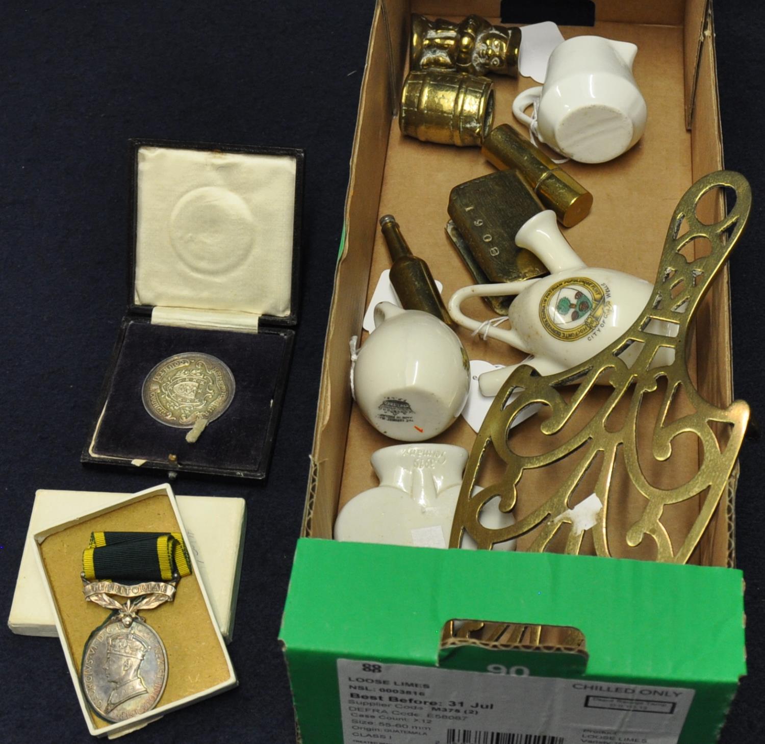 Box of assorted metalware, trench art, brass trivet, crested china, George VI Territorial army for