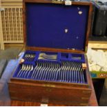 Early 20th Century oak canteen of silver plated cutlery marked 'Army and Navy' with brass recessed