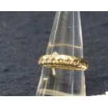 9ct gold ring with white stones. Size O. Approx weight 3g. (B.P. 21% + VAT)