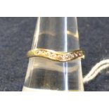 9ct gold cz half eternity ring. Size P. Weight 2 grams. (B.P. 21% + VAT)