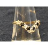9ct gold sapphire and diamond wishbone ring. Size O. Approx weight 2g. (B.P. 21% + VAT)