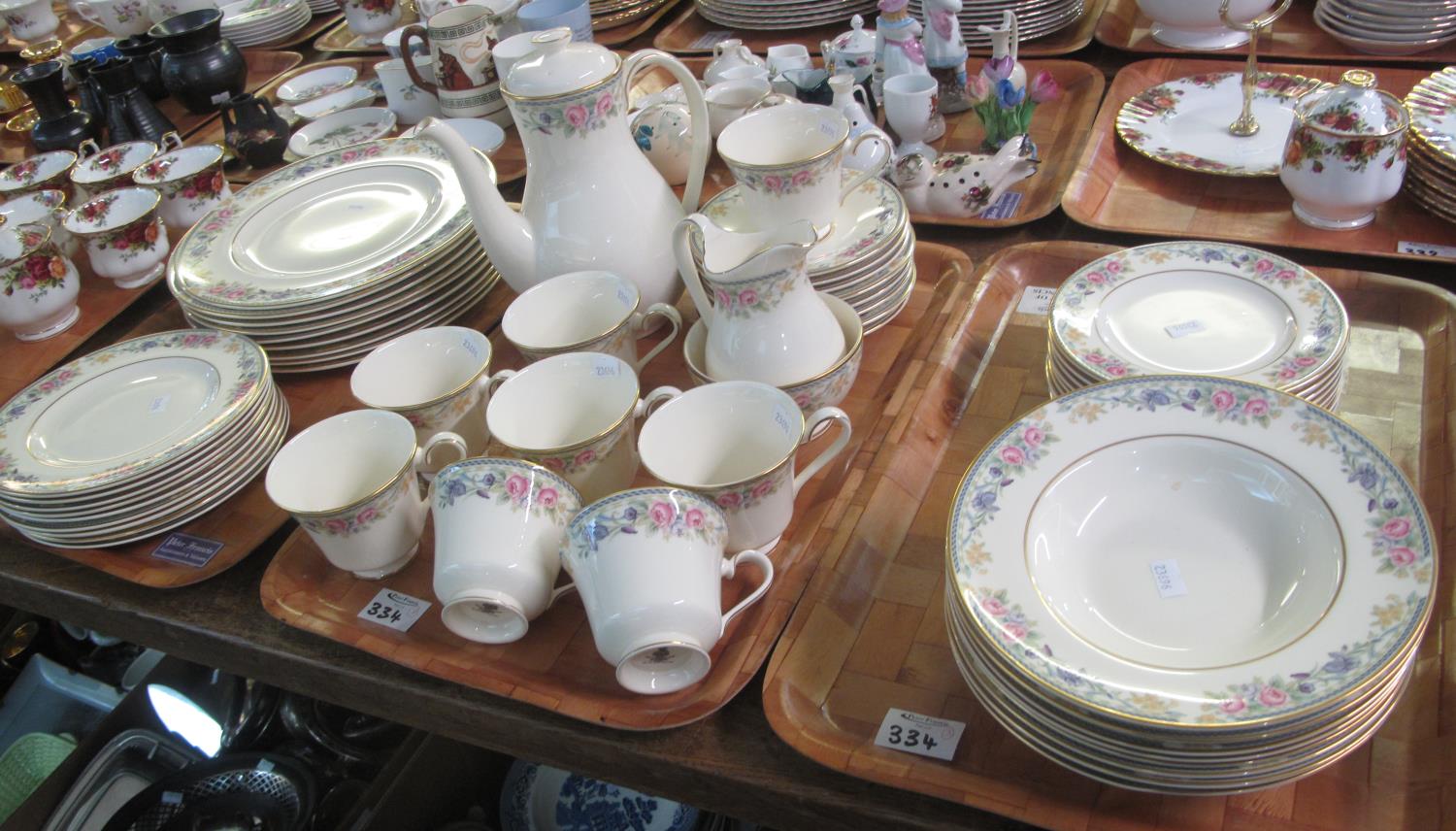 Three trays of Royal Doulton English fine bone china 'Eleanor' tea and dinnerware items to