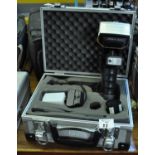 A Metz 45cl-4 camera flash gun with accessories in a small flight type aluminium case. (B.P. 21% +