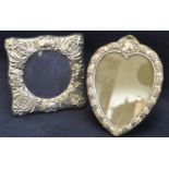 Modern square shaped silver repousse mounted photograph frame with circular aperture. Together