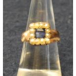 Georgian sapphire and pearl memorial ring set in yellow metal. Inscribed 1815. Ring size M. Approx