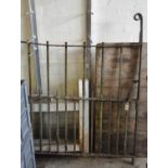 Wrought iron weathered drive or garden gate. 129cm wide approx. (B.P. 21% + VAT)