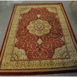 Modern Busan design rug or small carpet on red and cream ground. (B.P. 21% + VAT)