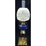 Early 20th Century double oil burner lamp with etched foliate glass frosted shade, blue glass