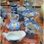 Tray of blue and white, mainly jugs, to include Willow pattern and others. (B.P. 21% + VAT)