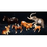 Collection of six ceramic wild and other animals, some West German, to include elephant, horses,