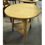 19th Century traditional pine cricket table, the base with shaped sides, diameter 77cm approx,