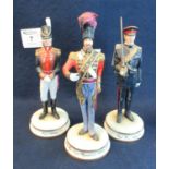 Three Michael Sutty porcelain military figurines to include; Royal Artillery 1815, Royal Horse