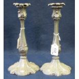 Pair of silver plated rococo style candle sticks. 27 cm high approximately. (B.P. 21% + VAT)