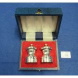 Cased silver salt and pepper grinders by Mills of Birmingham 1991 (a pair). (B.P. 21% + VAT)