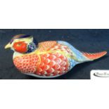 Royal Crown Derby bone china paperweight in the form of a pheasant, gold stopper to the base. (B.