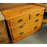 Early 20th Century pine straight front chest of two short and two long drawers with Art Nouveau