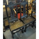 Pair of 18th Century oak splat back chairs dated 1716, the moulded seat above carved frieze standing