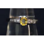 9ct white gold yellow sapphire and diamond ring. Ring size M. Weight approx 2.5 grams. (B.P. 21% +