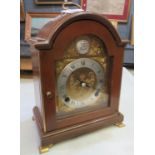 Reproduction mahogany framed two-train bracket clock by Elliot of London. With key. Retailed by