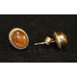 9ct gold and amber earrings. Weight approx 1.4 grams. (B.P. 21% + VAT)