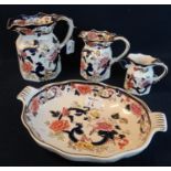 Three Mason's Ironstone graduated pouch shaped Mandalay dresser jugs, together with a Mandalay two