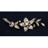 Diamond set floral spray brooch. Weight approx 8.5 grams. (B.P. 21% + VAT)