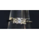 18ct white gold three stone diamond ring. The three princess cut diamonds an estimated total diamond