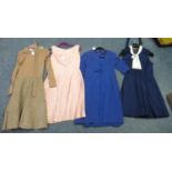 Four vintage dresses (50's - 70's) to include; a blue dress with pleated skirt and tie neck by